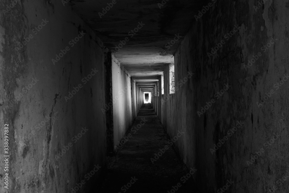 Interior of an abandoned building in black and white