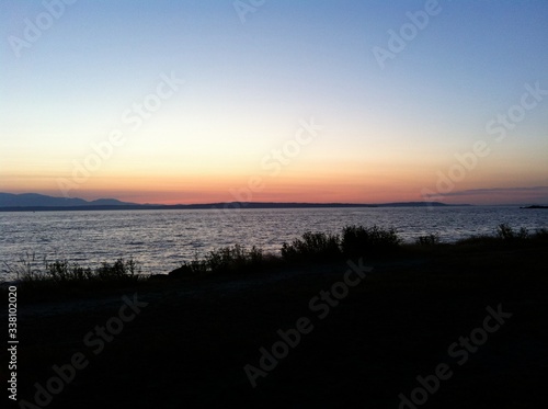 Panoramic sunset pacific ocean shore