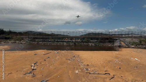 Airport in Asia. Passenger liner is gaining altitude