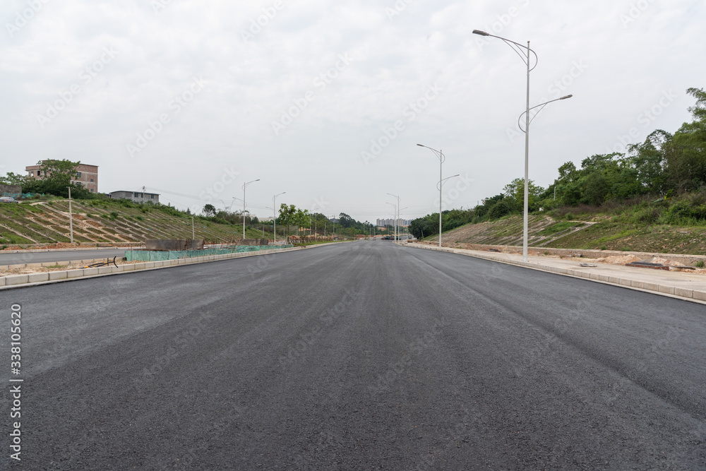 Perspective view of new asphalt road