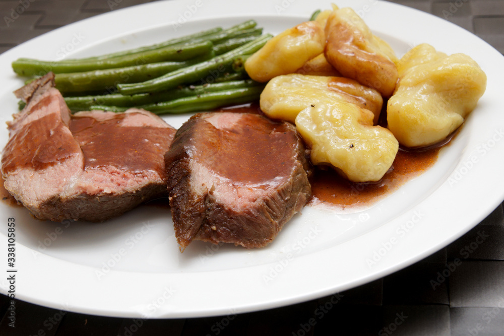 Leg of lamb with homemade gnocchi and green beans Leg of lamb with homemade gnocchi and green beans