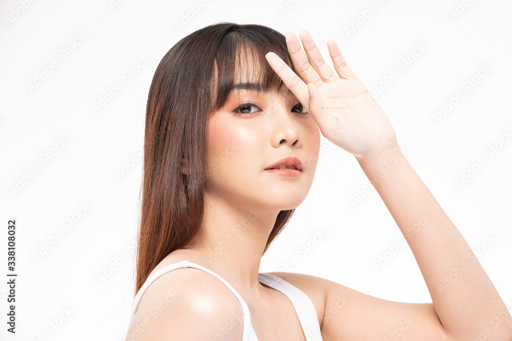 Beautiful Asian woman looking at camera hand up cover on face smile with clean and fresh skin Happy and cheerful with positive emotion on white background,Beauty Cosmetics and facial treatment Concept Beautiful Asian woman looking at camera hand up cover on face smile with clean and fresh skin Happy and cheerful with positive emotion on white background,Beauty Cosmetics and facial treatment Concept