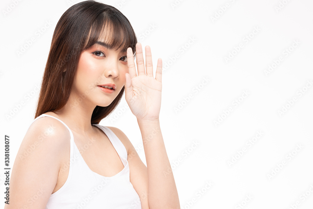 Young Beautiful Asian woman smile touching soft cheek with clean and fresh skin Happiness and cheerful with positive emotional,isolated on white background,Beauty Cosmetics and spa Treatment Concept