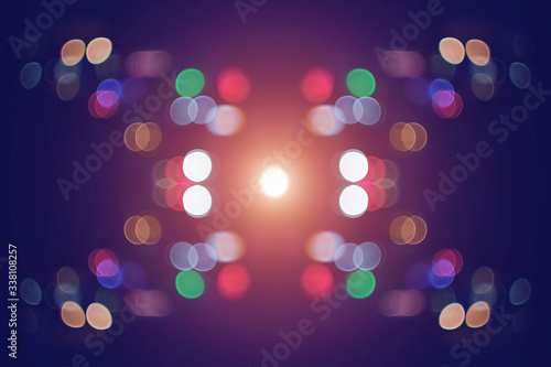 Abstract blurred background with bright colored bokeh lights, circles and lanes. Lights at night. © A Stock Studio