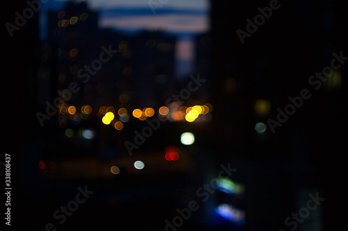 City night. Lights broke and blurred background. De focused urban street. Blur effect. © A Stock Studio