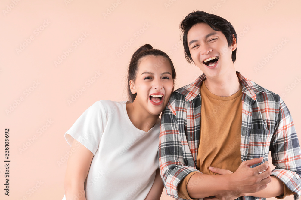 happiness freshness asian couple attractive male and female casual dress laugh smile with cheerful and enthusiasm together friendship relationship portrait with color isolate background happiness freshness asian couple attractive male and female casual dress laugh smile with cheerful and enthusiasm together friendship relationship portrait with color isolate background