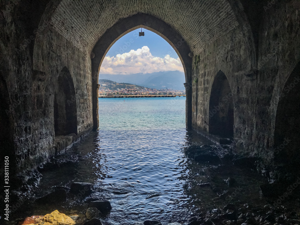 Old arch over the sea