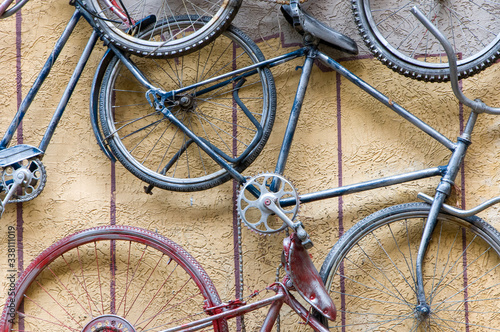bicycles in the street on the wall