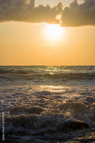 Amazing sea sunset  the sun  waves  clouds