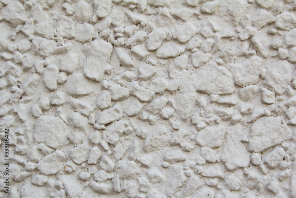 Closeup grey dirty stone wall with rough surface texture background. Closeup grey dirty stone wall with rough surface texture background.