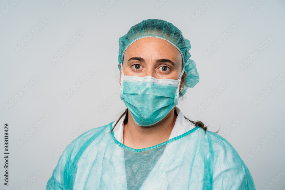 Doctor wearing protection Suit for Fighting Covid-19 (Corona virus) with white background Doctor wearing protection Suit for Fighting Covid-19 (Corona virus) with white background