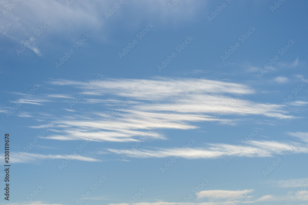 Partly cloudy sky at midday