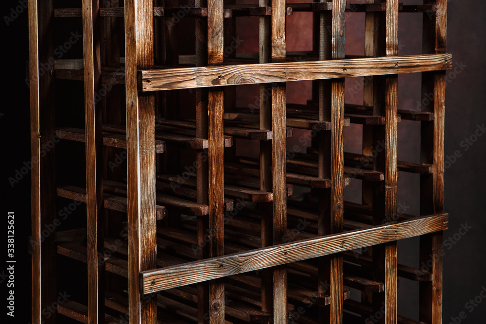 Stand for wine bottles. Wooden wine Cabinet in the wine cellar Stand for wine bottles. Wooden wine Cabinet in the wine cellar