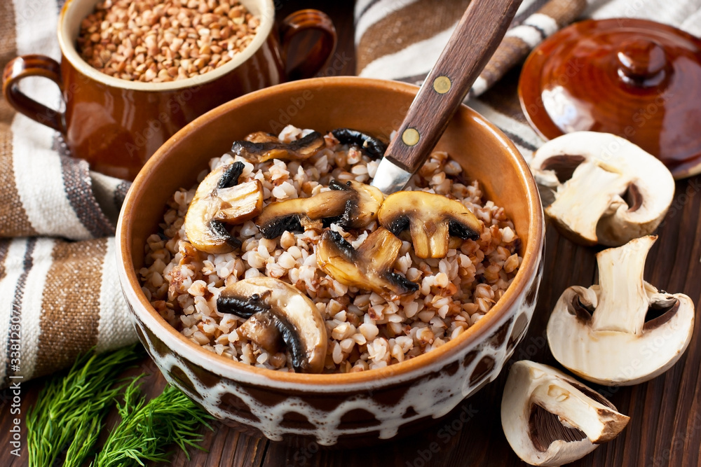 Fototapeta premium Buckwheat porridge with mushrooms - healthy eating