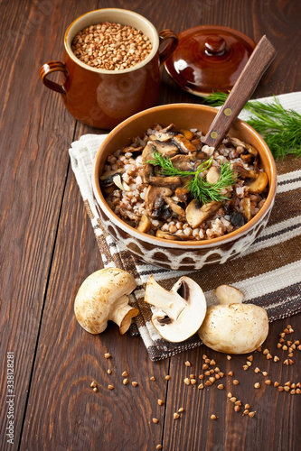 Crumbly buckwheat porridge with mushrooms, food healthy