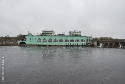 Volkhov River and Volkhov hydroelectric is hydroelectric station on  located in town of Volkhov, Leningrad Oblast, in northwestern Russia. photo