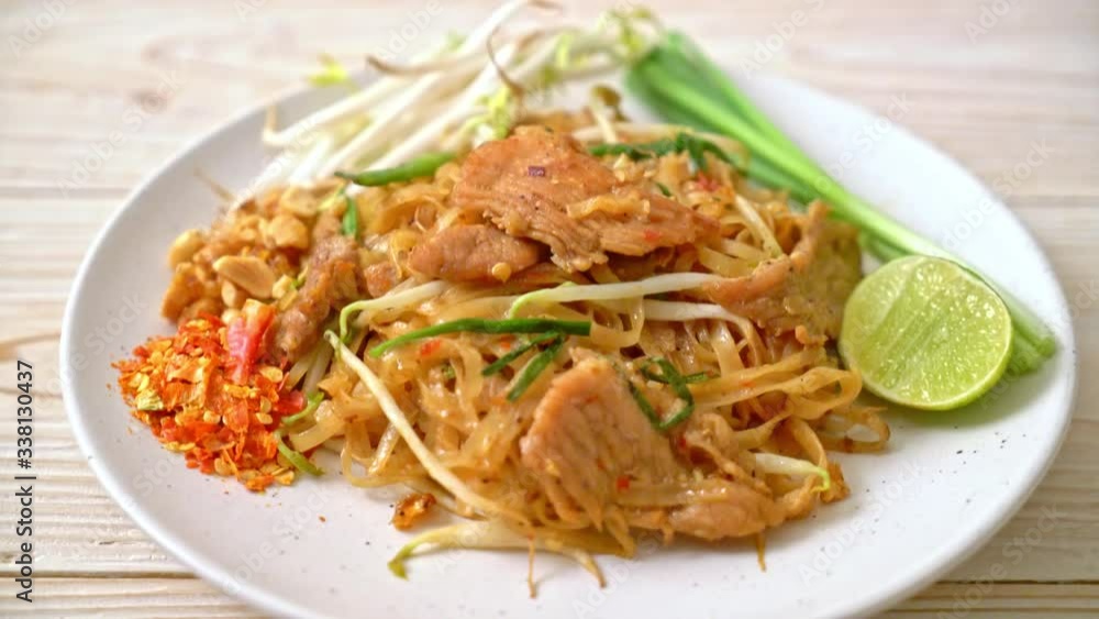 stir-fried rice noodles with pork in Asian style stir-fried rice noodles with pork in Asian style