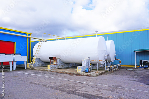 External fuel tanks at a filling station photo