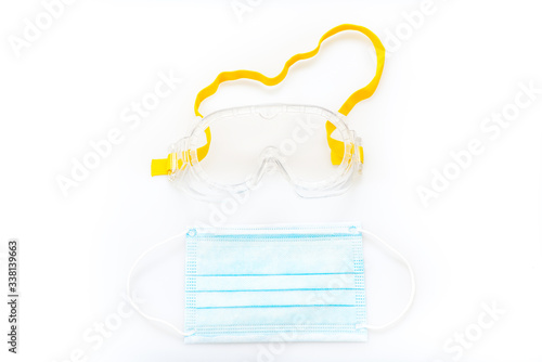 face mask and goggles isolated on white