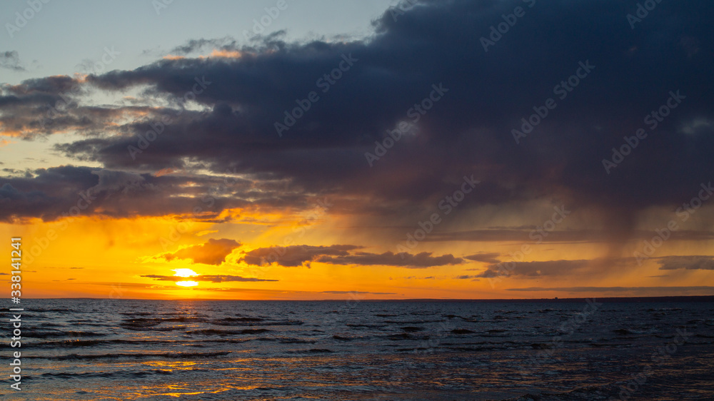 Fototapeta premium Sunset on the beach, beach, clouds.