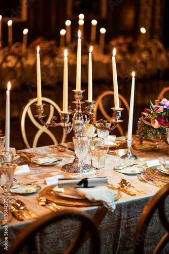 Elegany high end diner setup with golden cutlery