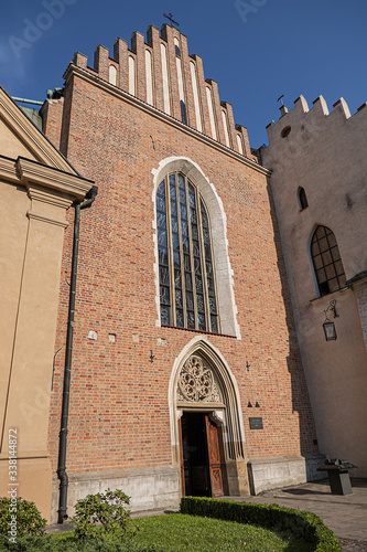 The Church of St. Francis of Assisi with Monastery of Franciscan Order (Inscription: Bazylika sw. Franciszka z Asyzu, from XIII century) in Old Town district of Krakow. Poland. photo