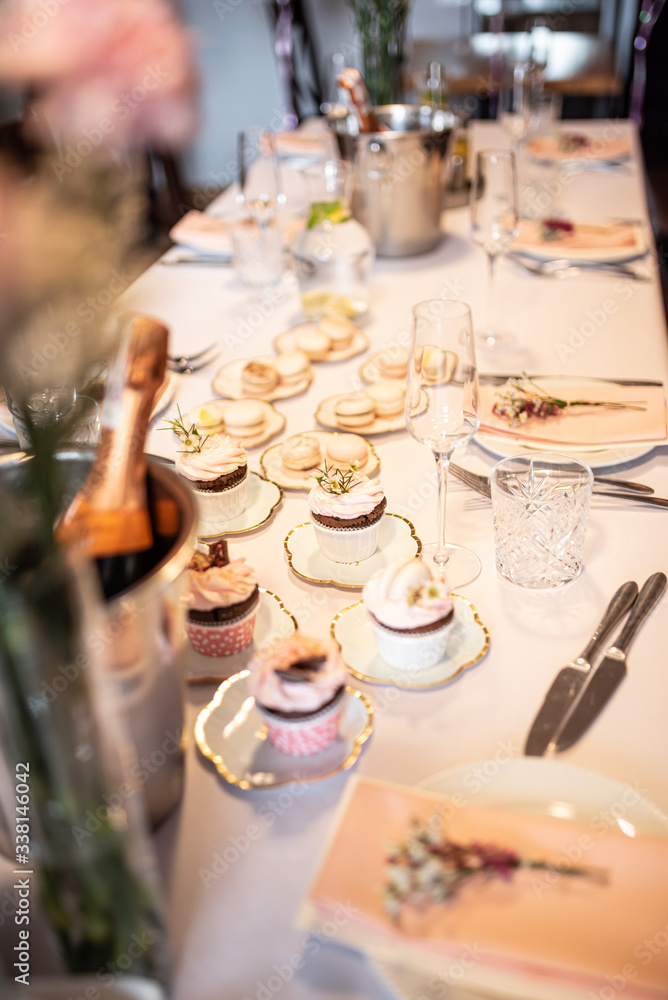 Beautiful table set for an event party or wedding reception . restaurant interior cakes on table Beautiful table set for an event party or wedding reception . restaurant interior cakes on table