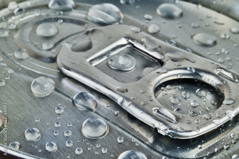 Top of metallic shiny drink can with water drops Top of metallic shiny drink can with water drops