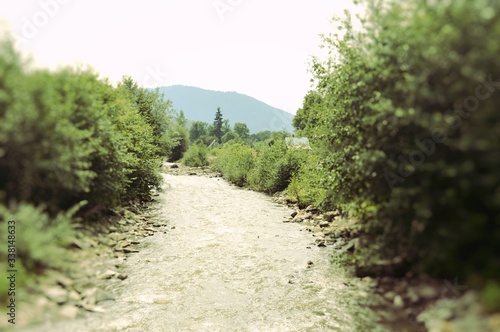 Mountain stream against the sky