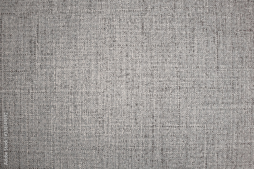 gray fabric texture with large threads. Top view
