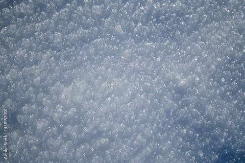 Texture of natural snow. View above the snow.