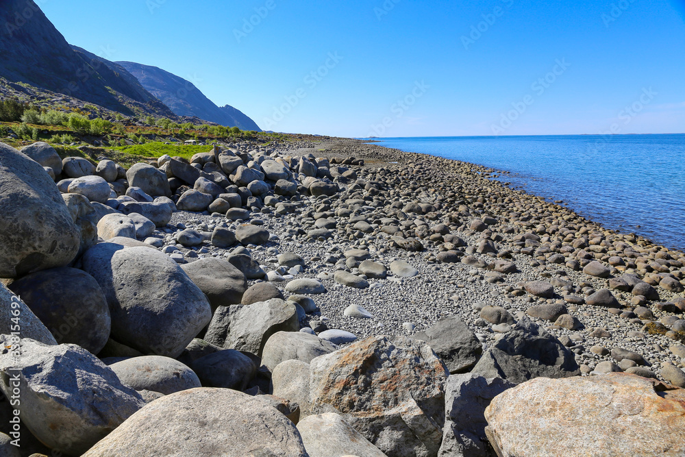 Rolling stones on Sundsvall beach, Vega in Nordland county