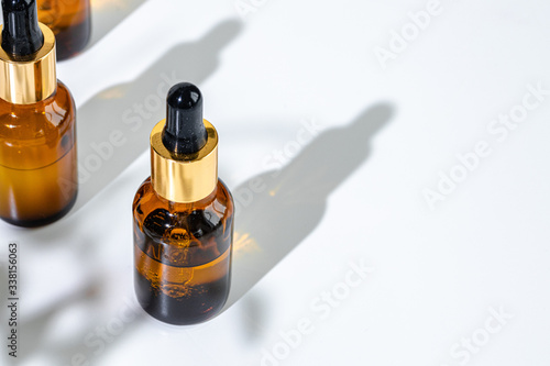 Wallpaper Mural Oily skincare moistrizing brown glass jar with pipette close up Torontodigital.ca