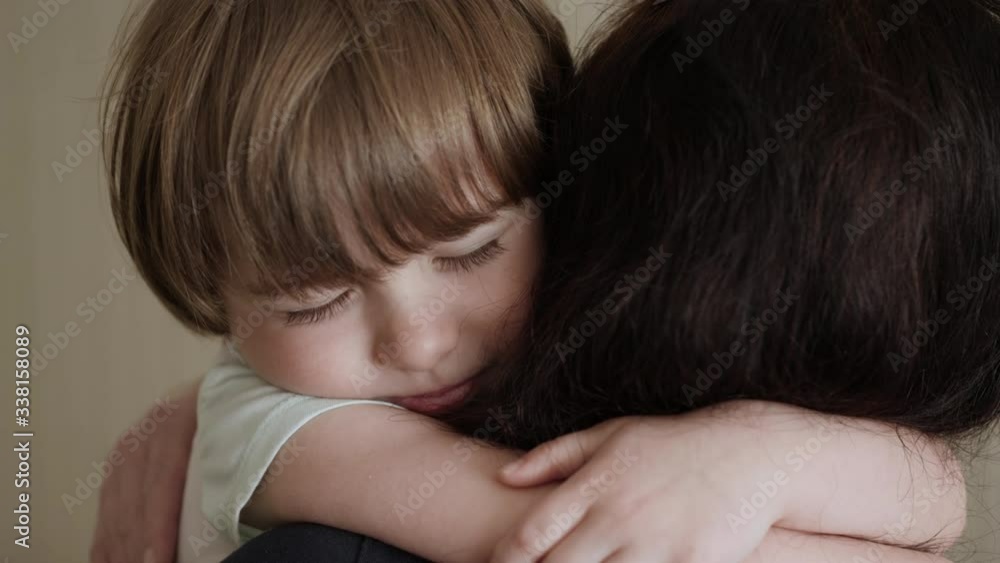 Happy Foster Family. Adorable Small Child Son Embrace Adoptive Mom Cuddling Enjoy Tender Sweet Moment. Affectionate Little Kid Boy Hugging Mother With Eyes Closed. Child Boy Hugging Foster Mother. Happy Foster Family. Adorable Small Child Son Embrace Adoptive Mom Cuddling Enjoy Tender Sweet Moment. Affectionate Little Kid Boy Hugging Mother With Eyes Closed. Child Boy Hugging Foster Mother.