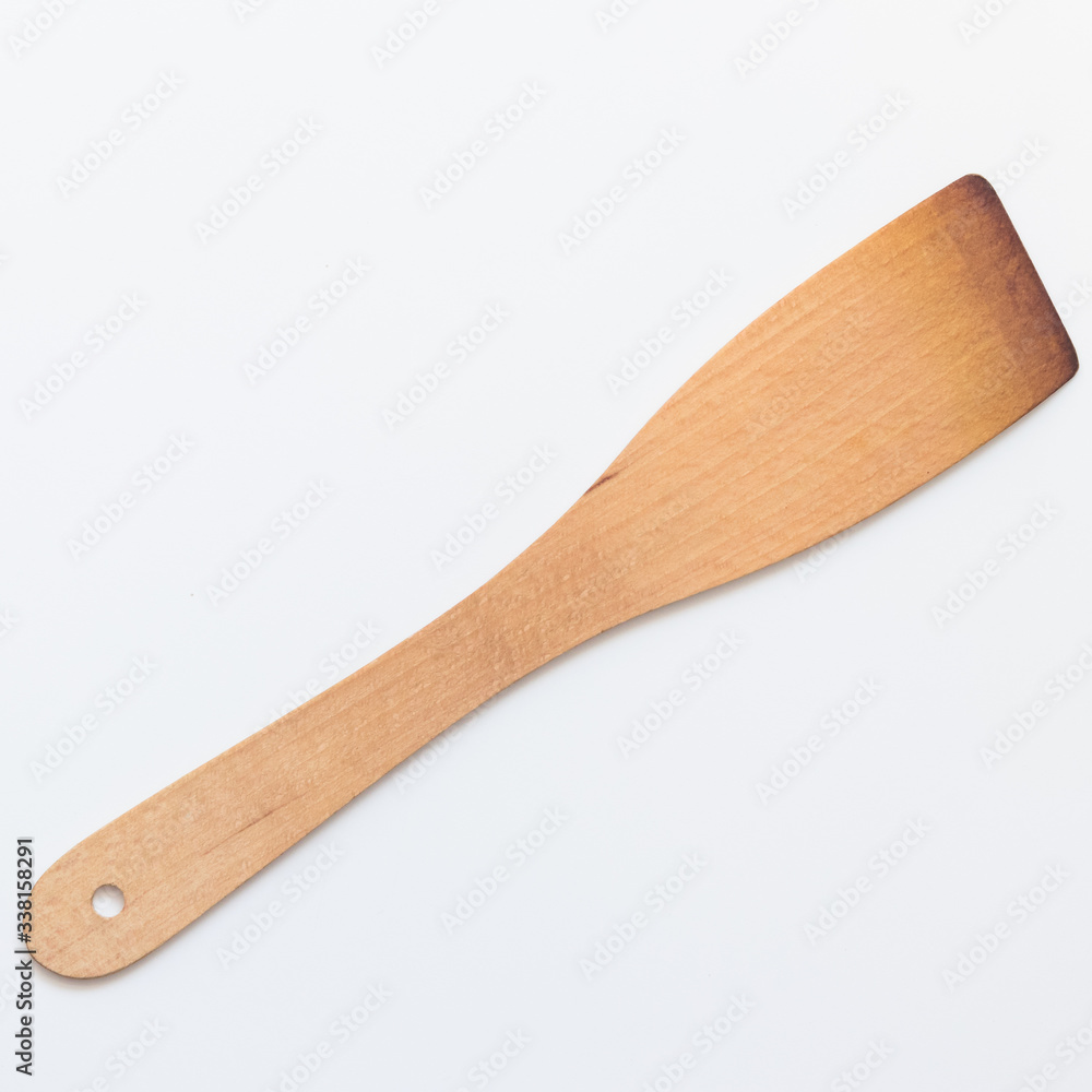Wooden Kitchen Utensils. Kitchen Wooden Spatula on white background. For for Cooking, Baking and Mixing Wooden Kitchen Utensils. Kitchen Wooden Spatula on white background. For for Cooking, Baking and Mixing