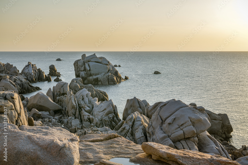 Beautiful sunset above cliffs in Capo Testa