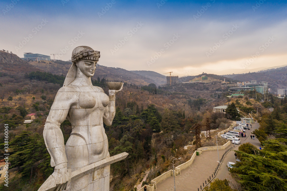 Aerial view of statue of Mother of Georgia (Kartlis Deda) overlooking Tbilisi City from Sololaki Hill.