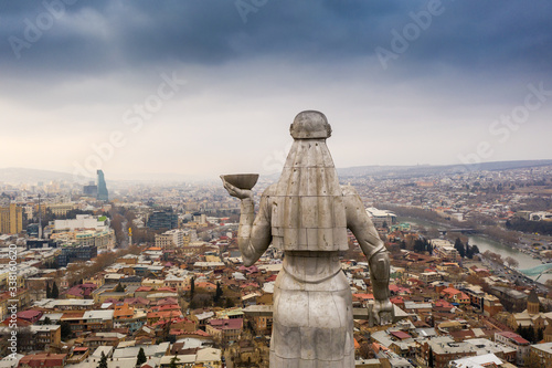Aerial view of statue of Mother of Georgia (Kartlis Deda) overlooking Tbilisi City from Sololaki Hill.