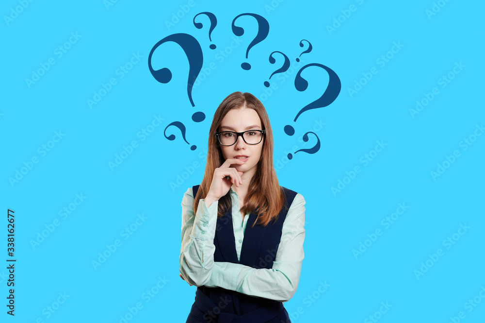 young woman thinking with question mark young woman thinking with question mark