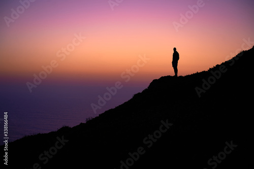 silhouette of a man at a sunset