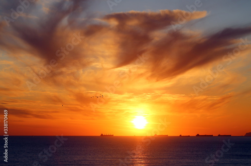 Beautiful photo of a bright sunset on the sea