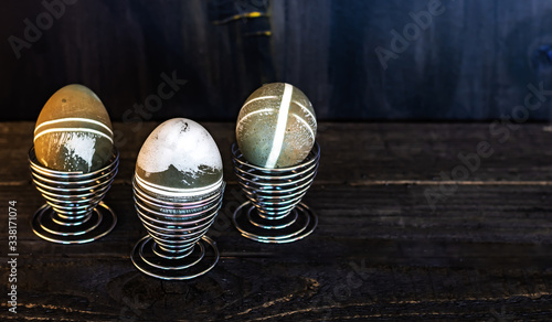 Traditional easter eggs on dark background and rustic cloth