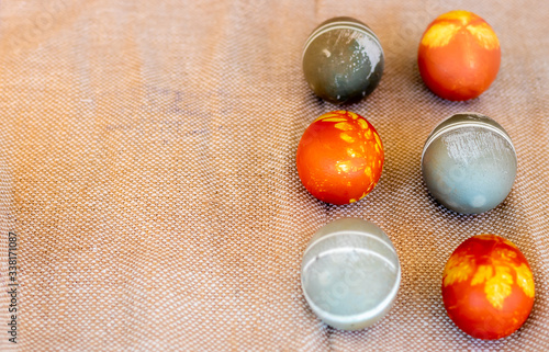 Traditional easter eggs on dark background and rustic cloth
