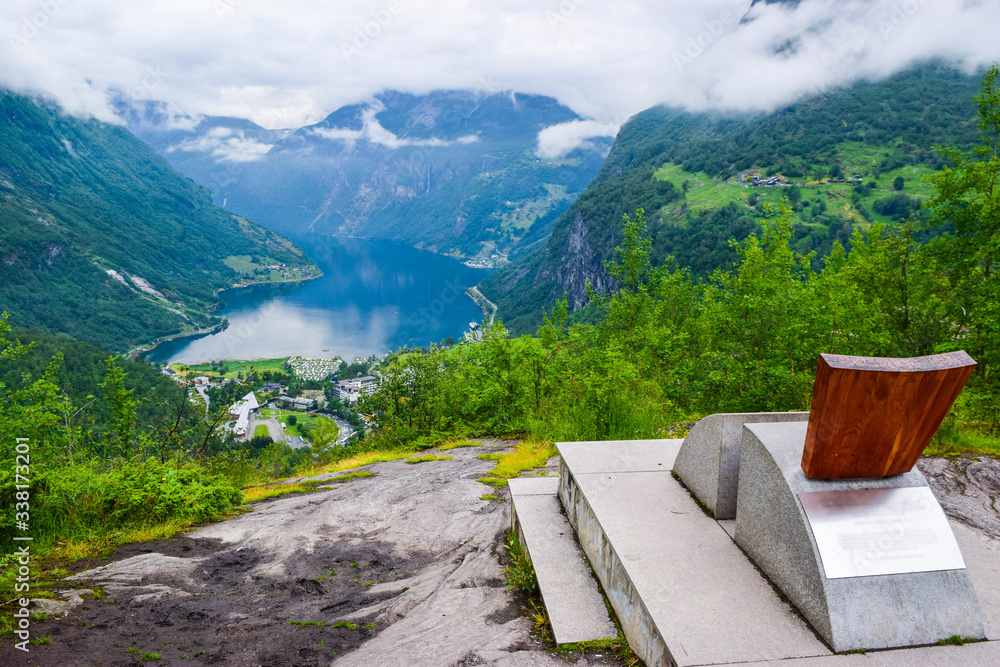 Queen Sony Chair on the Flydalsjuvet Viewpoint. The Geiranger village and Geirangerfjord landscape. Norway.
