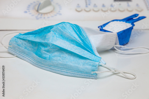 Medical surgical masks. Medical masks in large deficit during the covid-19 pandemic. The absence of masks in city pharmacies makes people wash them after use.
