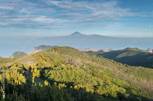 View of Teide and Tenerife over the rugged landscape of La Gomera