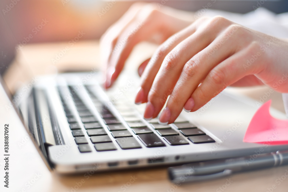 business woman working on laptop computer on wooden desk as concept with social media success technology. business woman working on laptop computer on wooden desk as concept with social media success technology.