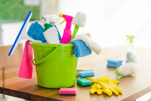 Bucket or basket with cleaning items for wash or house cleaning.