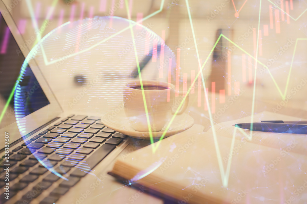 Double exposure of financial chart drawing and desktop with coffee and items on table background. Concept of forex market trading Double exposure of financial chart drawing and desktop with coffee and items on table background. Concept of forex market trading