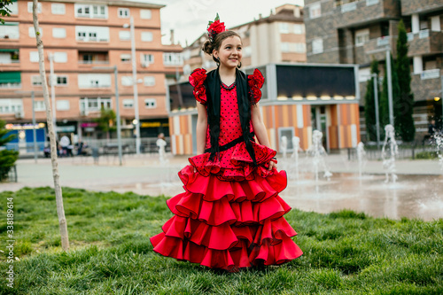 girl dressed in red flamenco dress